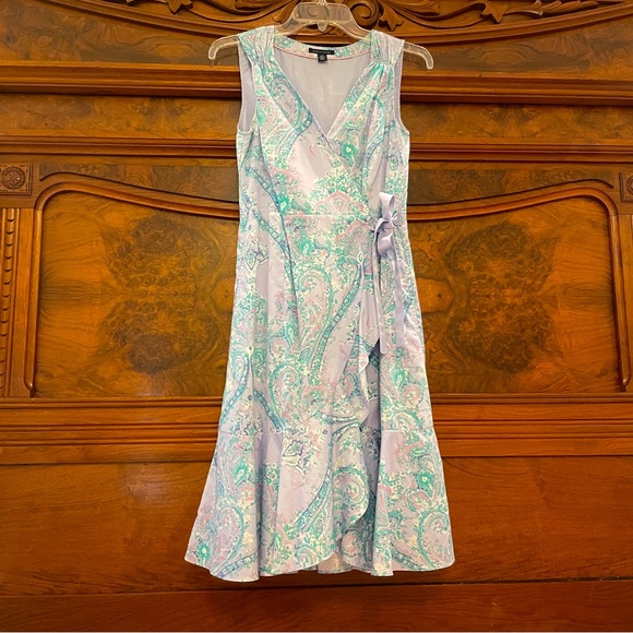 Tommy Hilfiger Dresses & Skirts - Tommy Hilfiger Sleeveless Wrap Dress with Ribbon tie and lower ruffle detail.